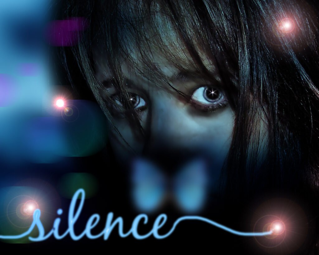 Photo o a girl hiding behind the word silence
