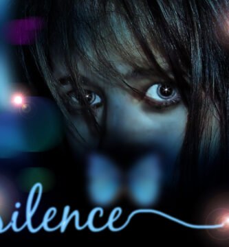 Photo o a girl hiding behind the word silence
